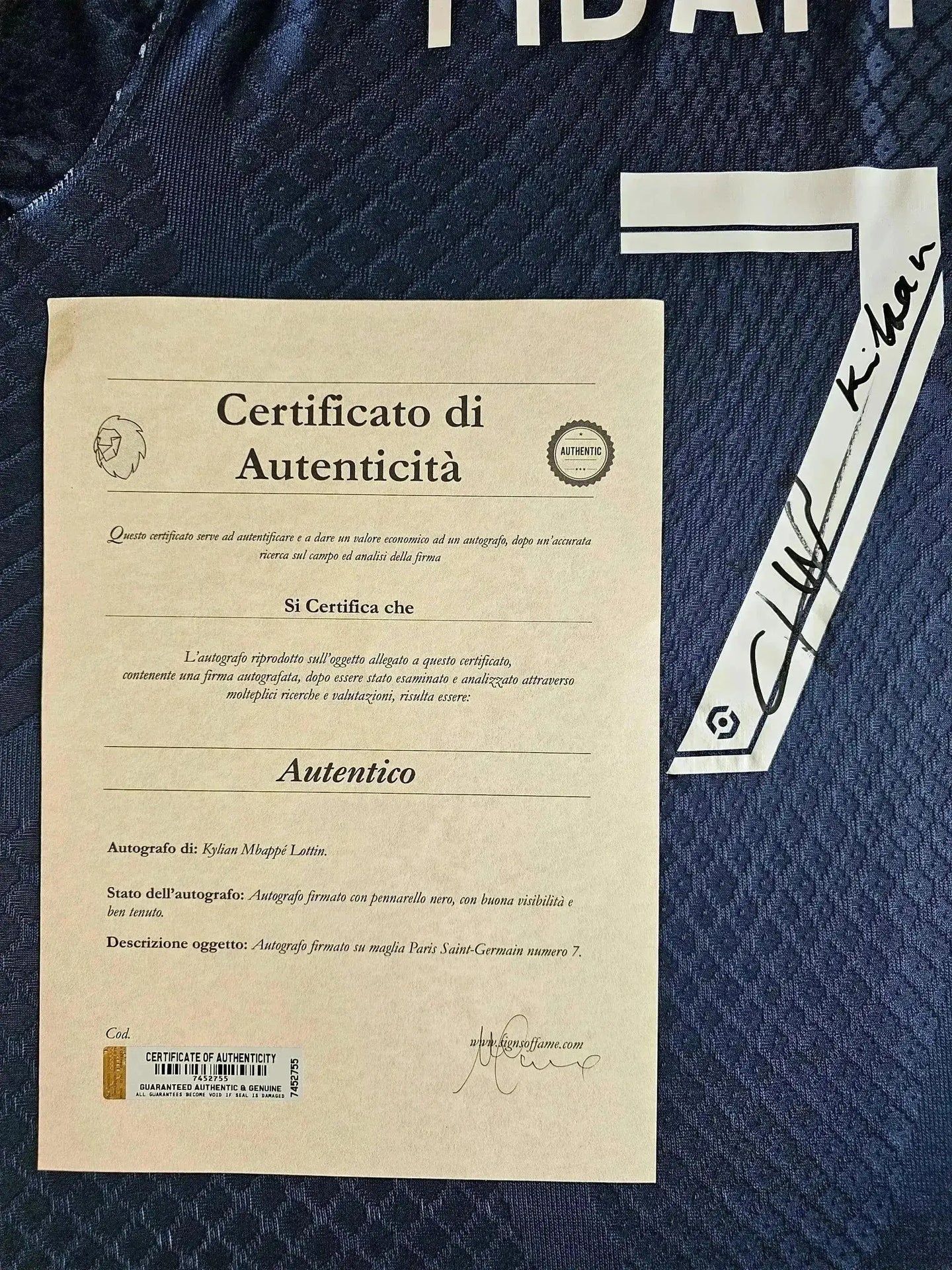 Signed certificate of authenticity for Kylian Mbappé No. 7 Paris Saint-Germain soccer jersey.