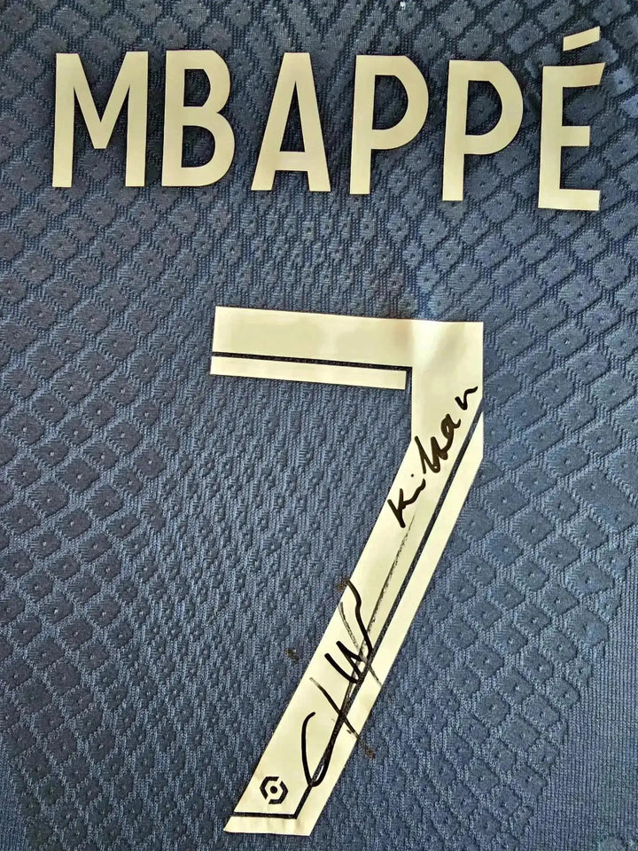Close-up of the back showing MBAPPÉ, No. 7, and Kylian Mbappé&