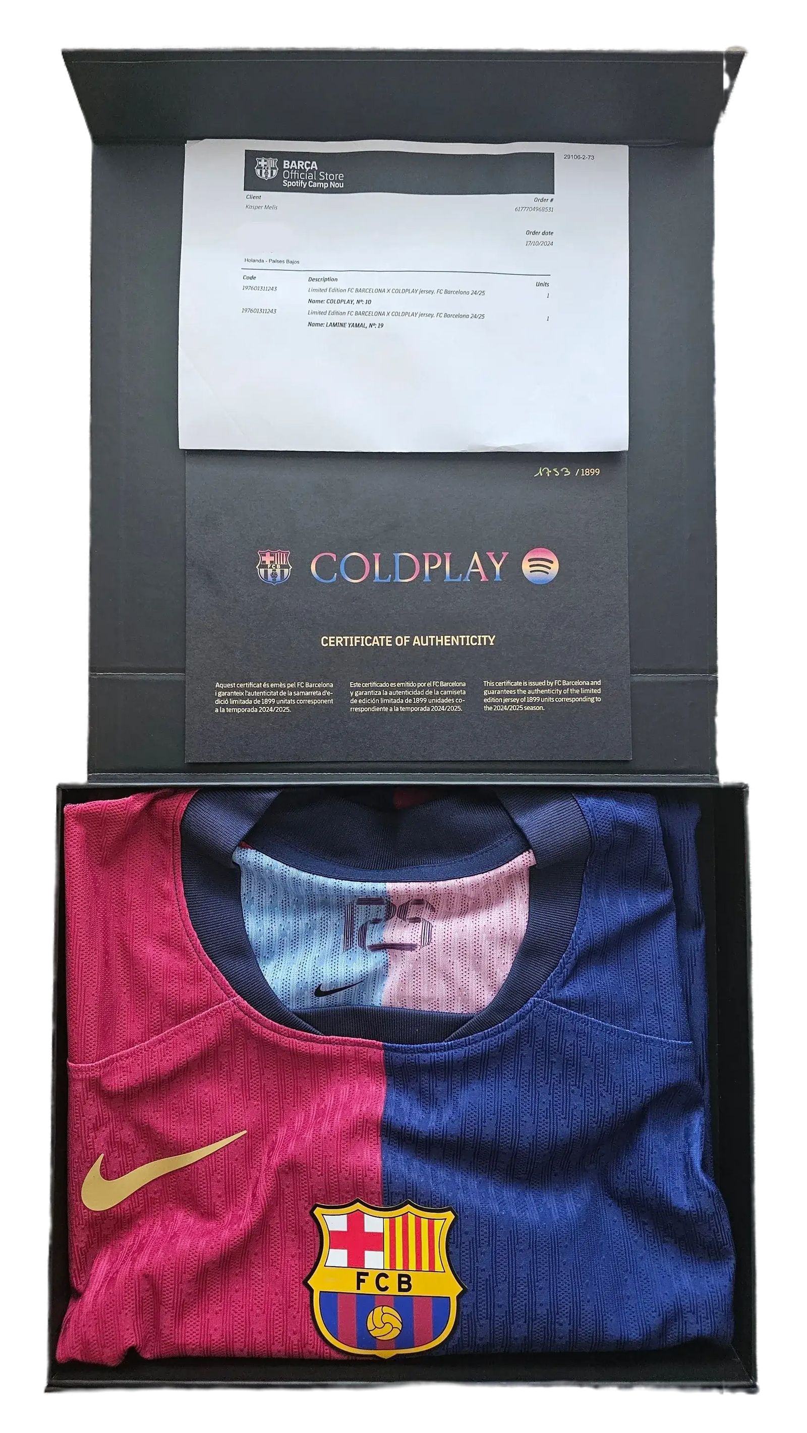 A boxed limited edition FC Barcelona 2024 Coldplay shirt with Lamine Yamal's name and number 19 on the back, displayed in special collector's packaging with a certificate of authenticity.