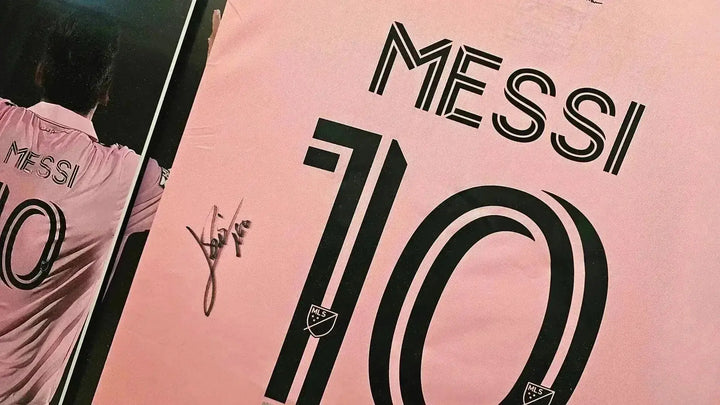 Back view featuring the name MESSI, No. 10, and a visible signature.