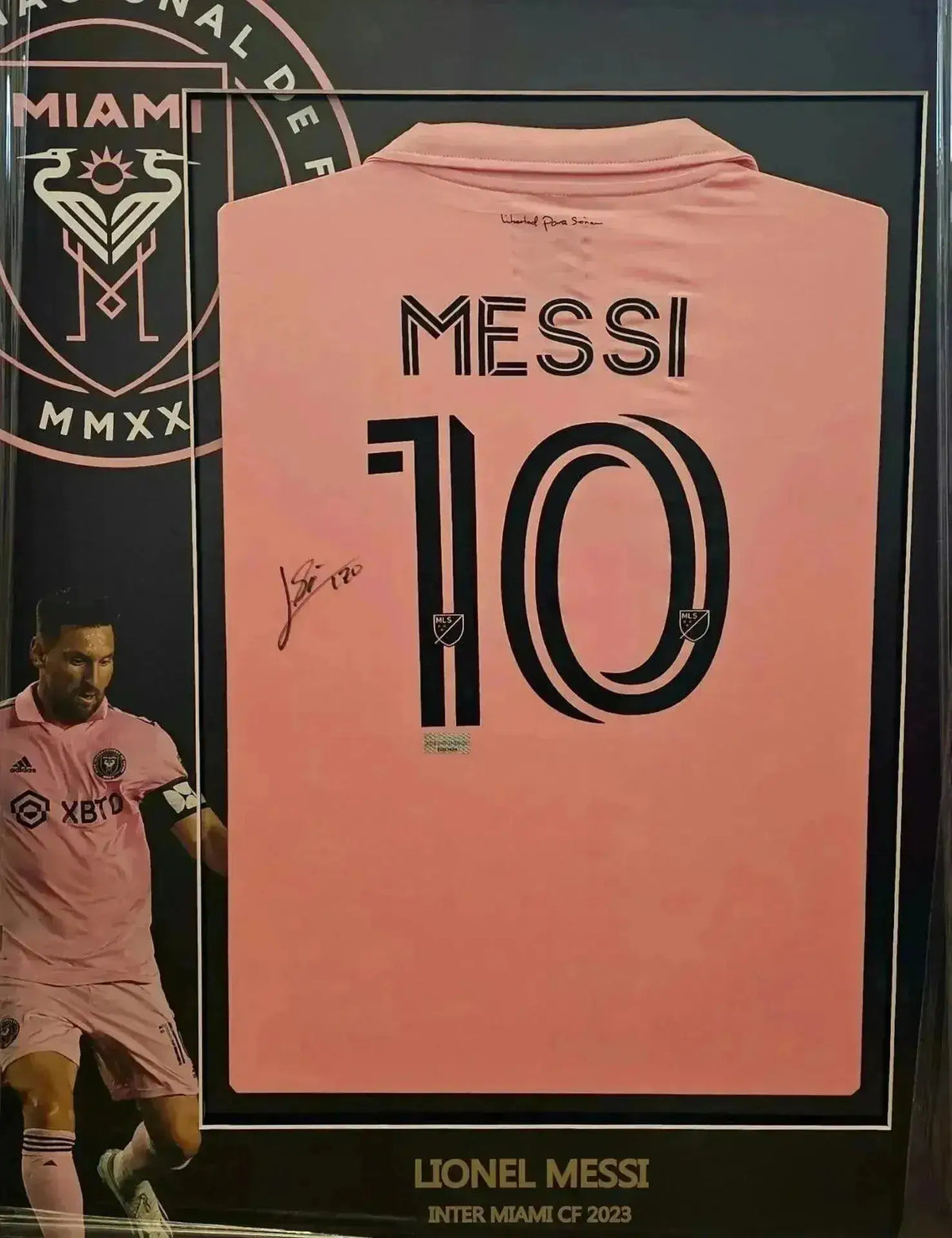 Back view showing player name MESSI, number 10, and signature.