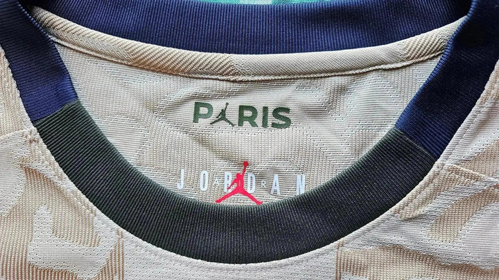 Close-up of collar featuring &