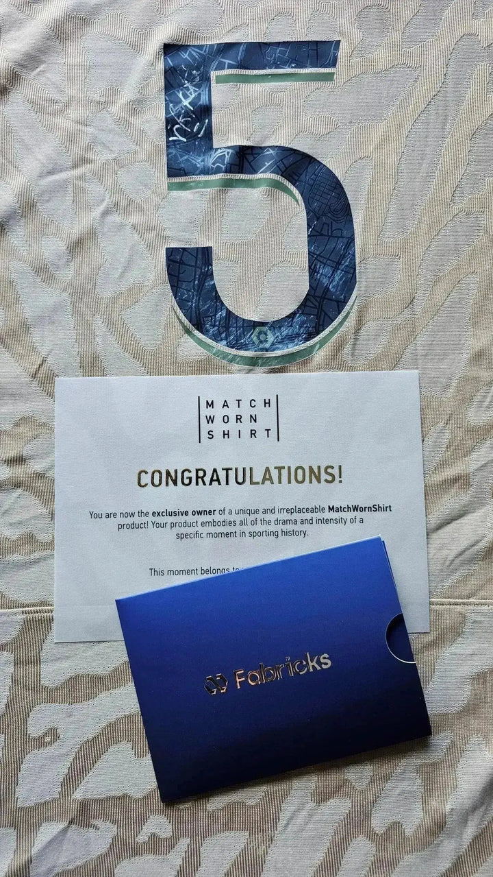 Close-up of No. 5 on match-worn shirt with MATCH WORN SHIRT and congratulations note visible.