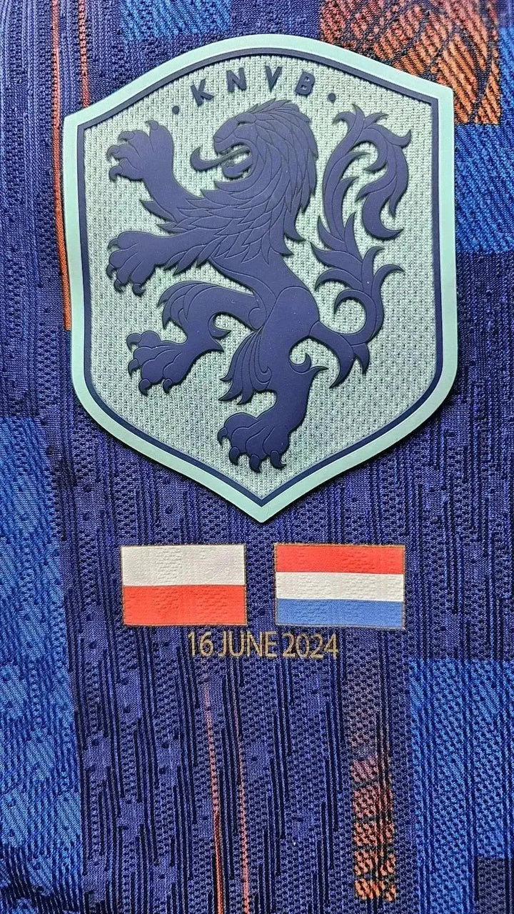 Crest detail featuring KNVB lion badge, Poland and Netherlands flags, and date 16 June 2024.