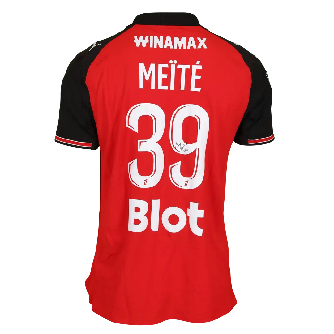 Back view of red and black Stade Rennes shirt, featuring MEÏTÉ, No. 39, and a visible signature.