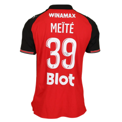 Back view of red and black Stade Rennes shirt, featuring MEÏTÉ, No. 39, and a visible signature.