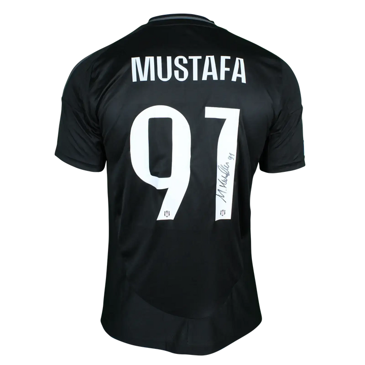 Back view showing MUSTAFA and No. 91 with a visible signature on the football shirt.