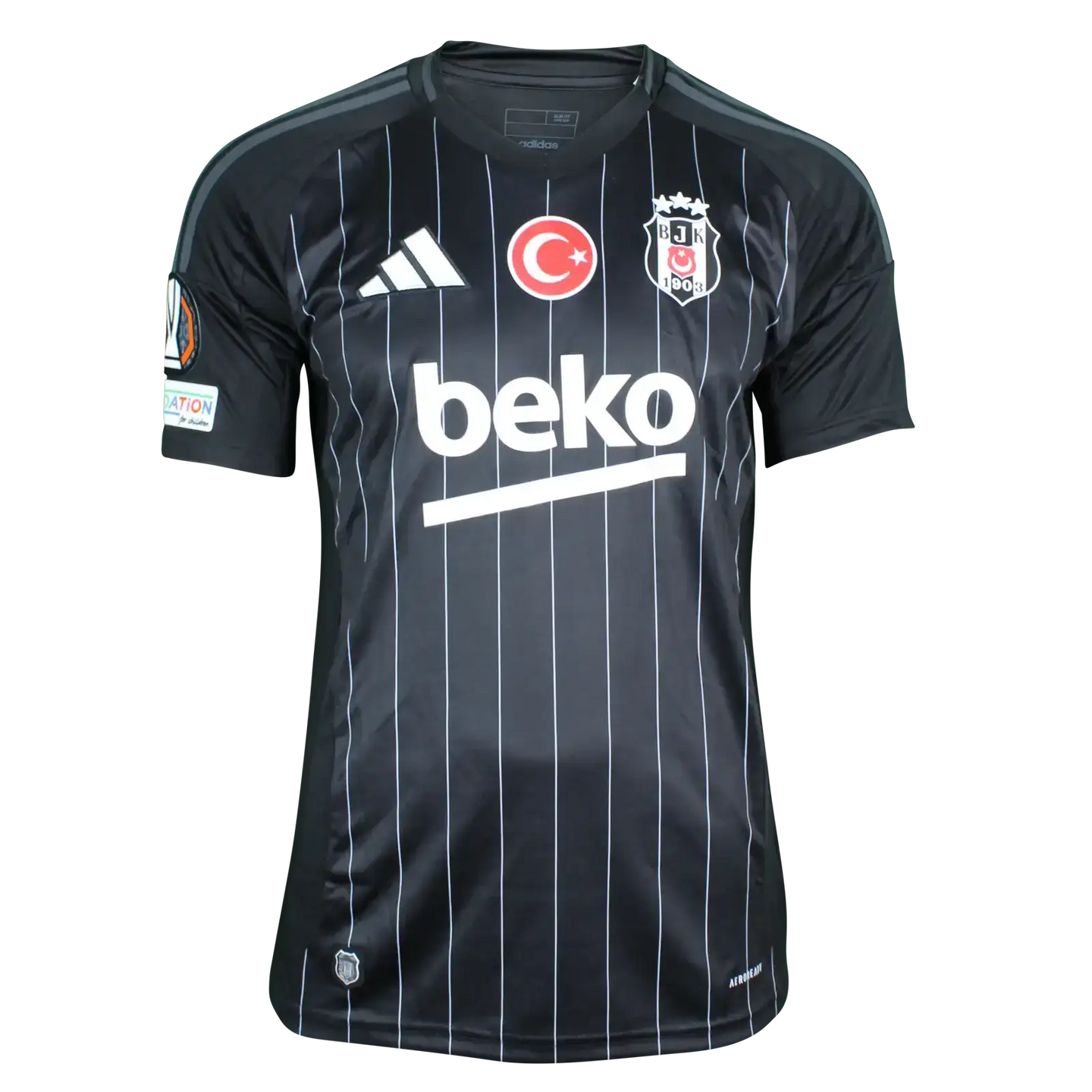 Front view of the black Beşiktaş football shirt with the beko sponsor and team crest.