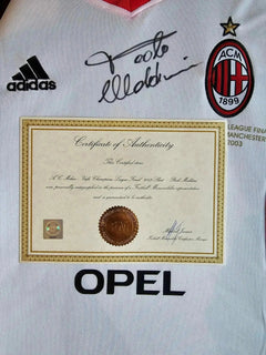 AC Milan football shirt with Paolo Maldini signature, adidas logo, and 'OPEL' sponsor text.