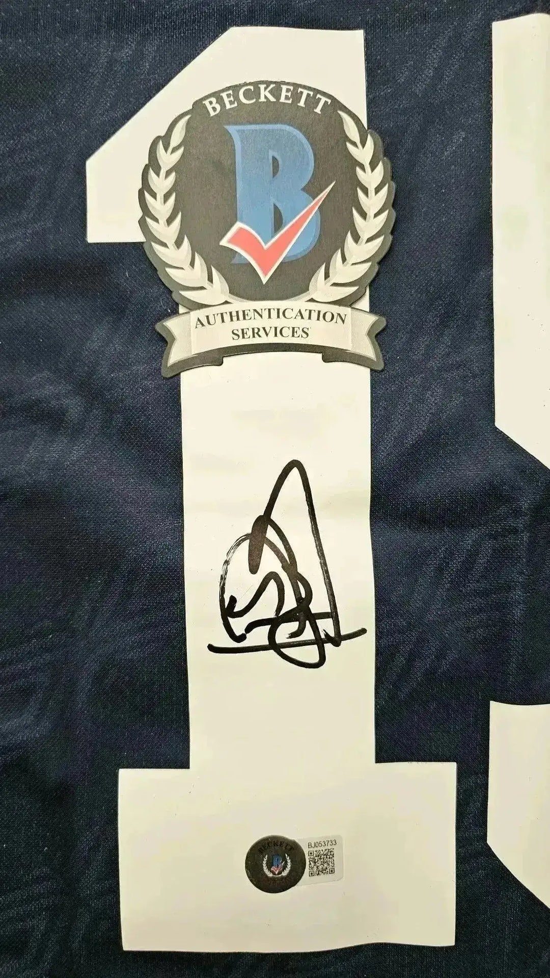 Detail showing signature on No. 15 with Beckett Authentication label.