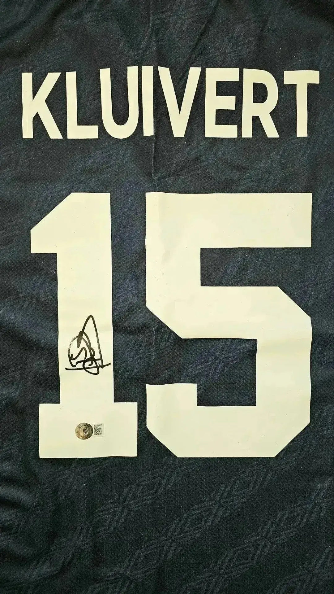 Back view showing KLUIVERT and No. 15, with a visible signature detail.