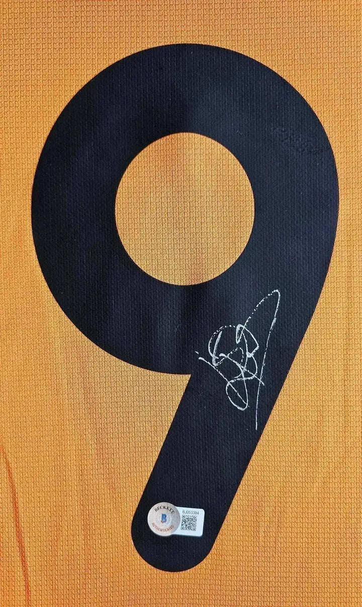 No. 9 with Patrick Kluivert's signature visible at the bottom right corner.