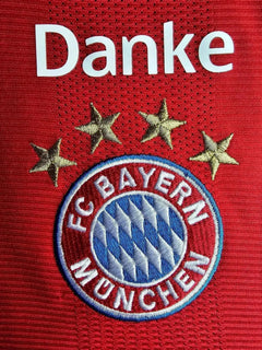 Detail view showing 'Danke', FC Bayern München crest, and three stars on a red background.