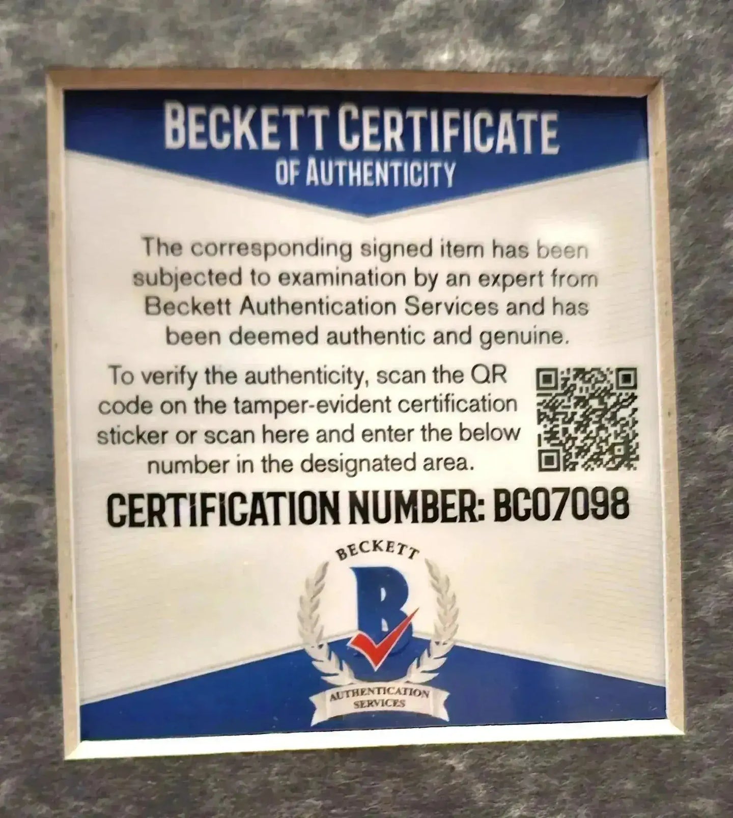 Beckett Certificate of Authenticity displaying certification number BCO7098.