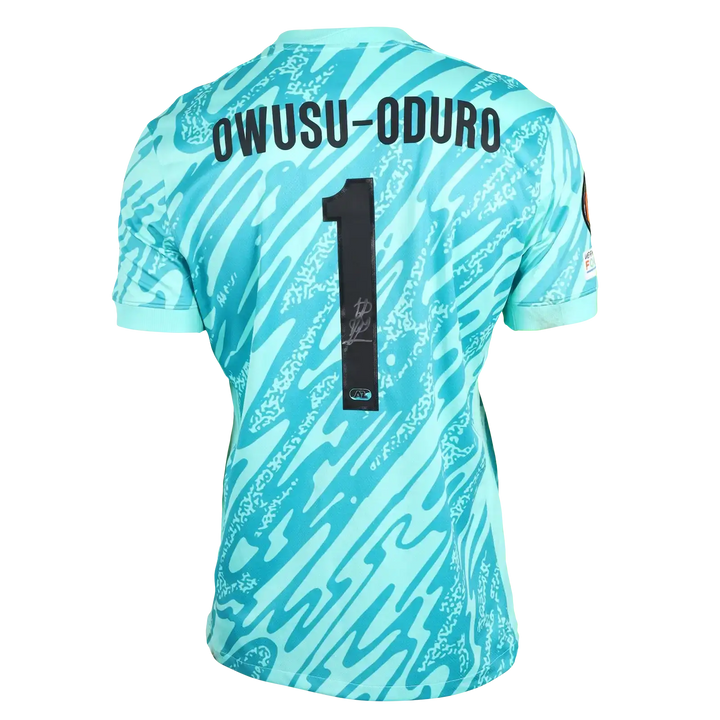 Back view featuring name Owusu-Oduro, No. 1, and a visible signature.