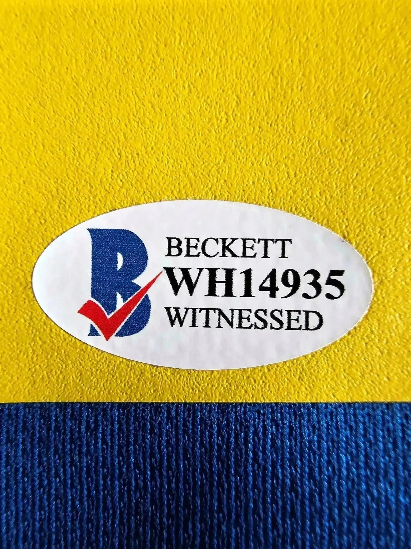 Beckett certification label showing WH14935 and witnessed verification.