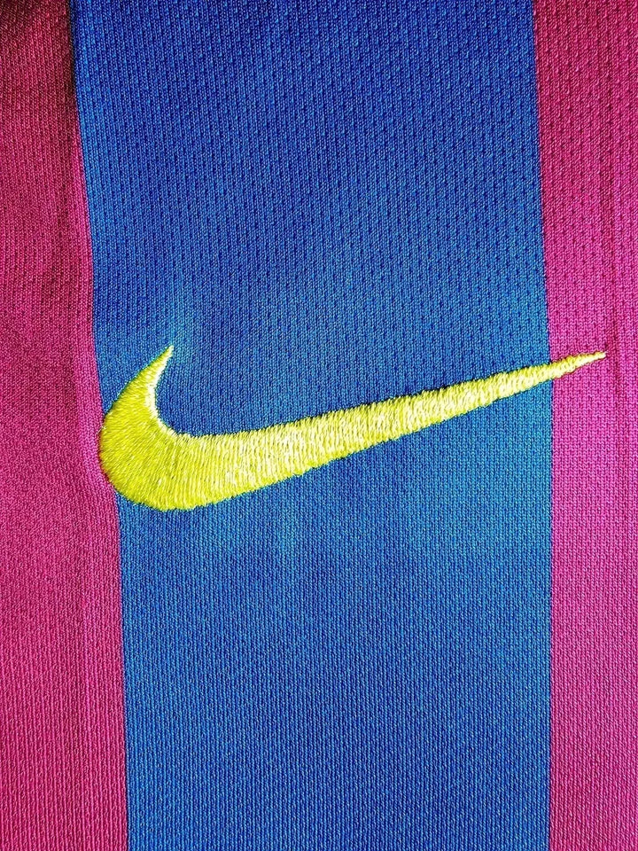 Close-up of Nike logo in yellow stitching on FC Barcelona&