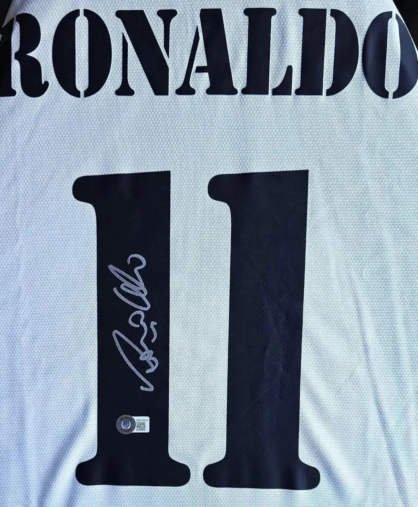 Back view featuring the name RONALDO and No. 11 with a visible signature.
