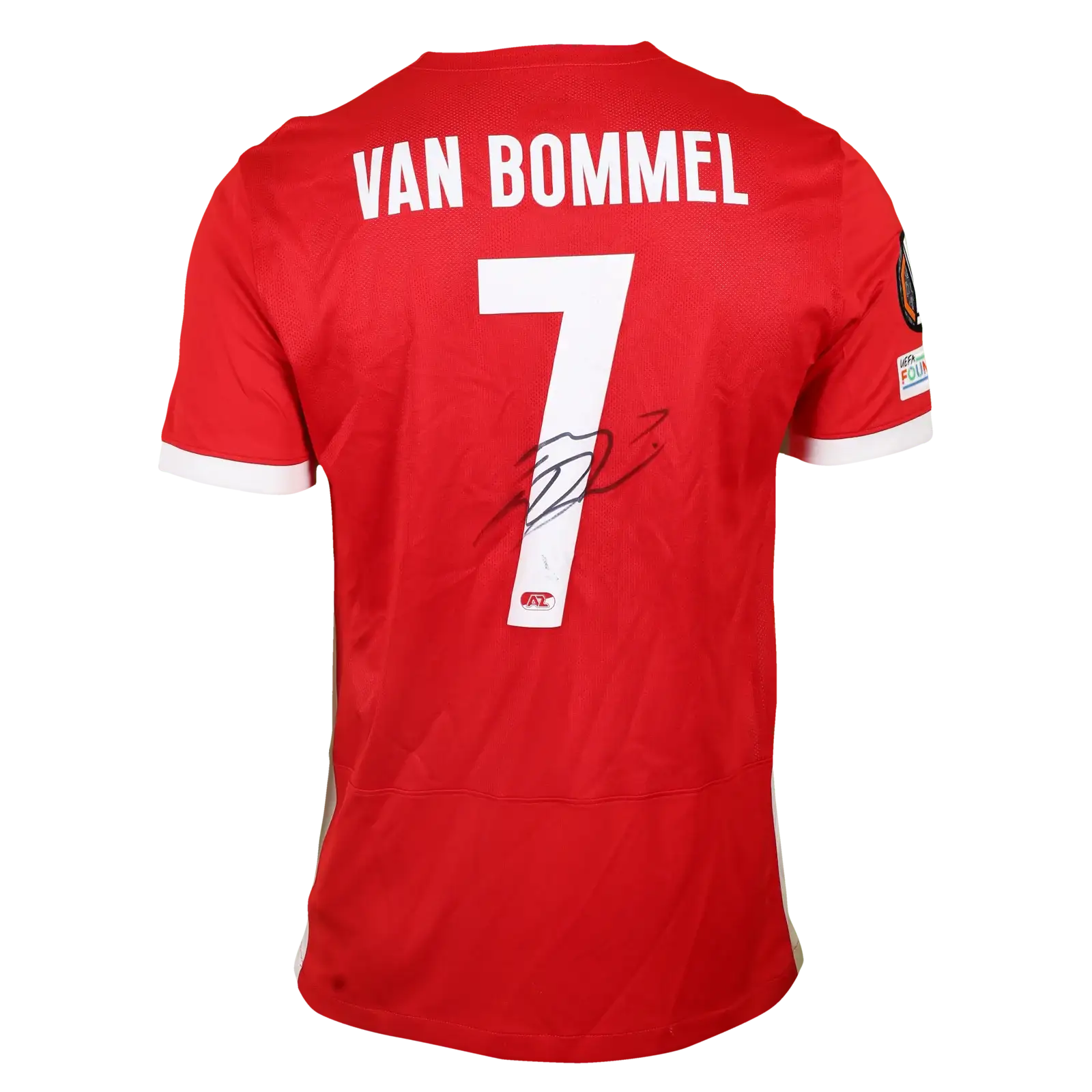 Back view showing No. 7, name 'VAN BOMMEL', and a visible signature.