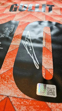 Detail view showing the No. 10 and Ruud Gullit's signature on the soccer jersey.