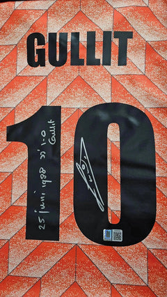 Detail showing the name GULLIT, No. 10, and a signature, alongside date markings on a signed soccer jersey.