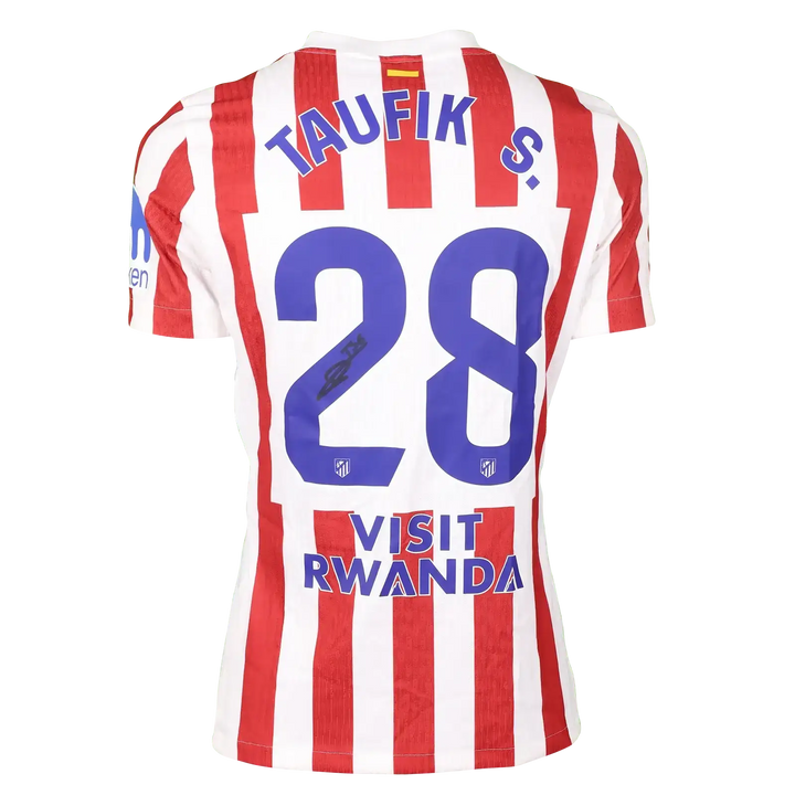 Back view of Taufik Seidu 28 Atlético Madrid shirt with VISIT RWANDA and signature detail.