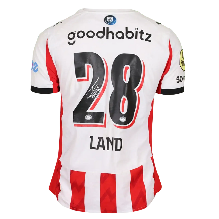 Back view showing No. 28, name LAND, and signature with red and white striped design.