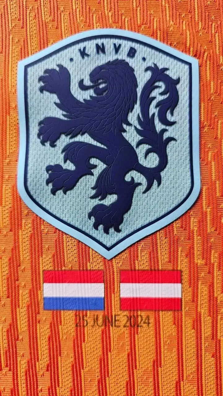 Crest detail with the KNVB logo and flags of Netherlands and Austria with date 25 JUNE 2024.