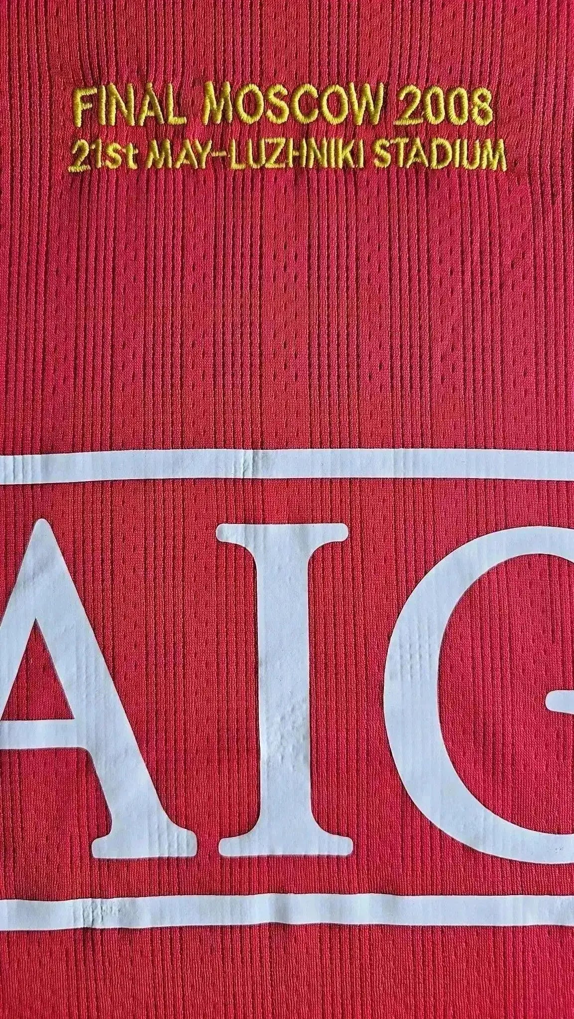 Embroidered text reading 'FINAL MOSCOW 2008 21st MAY-LUZHNIKI STADIUM' on a red background.
