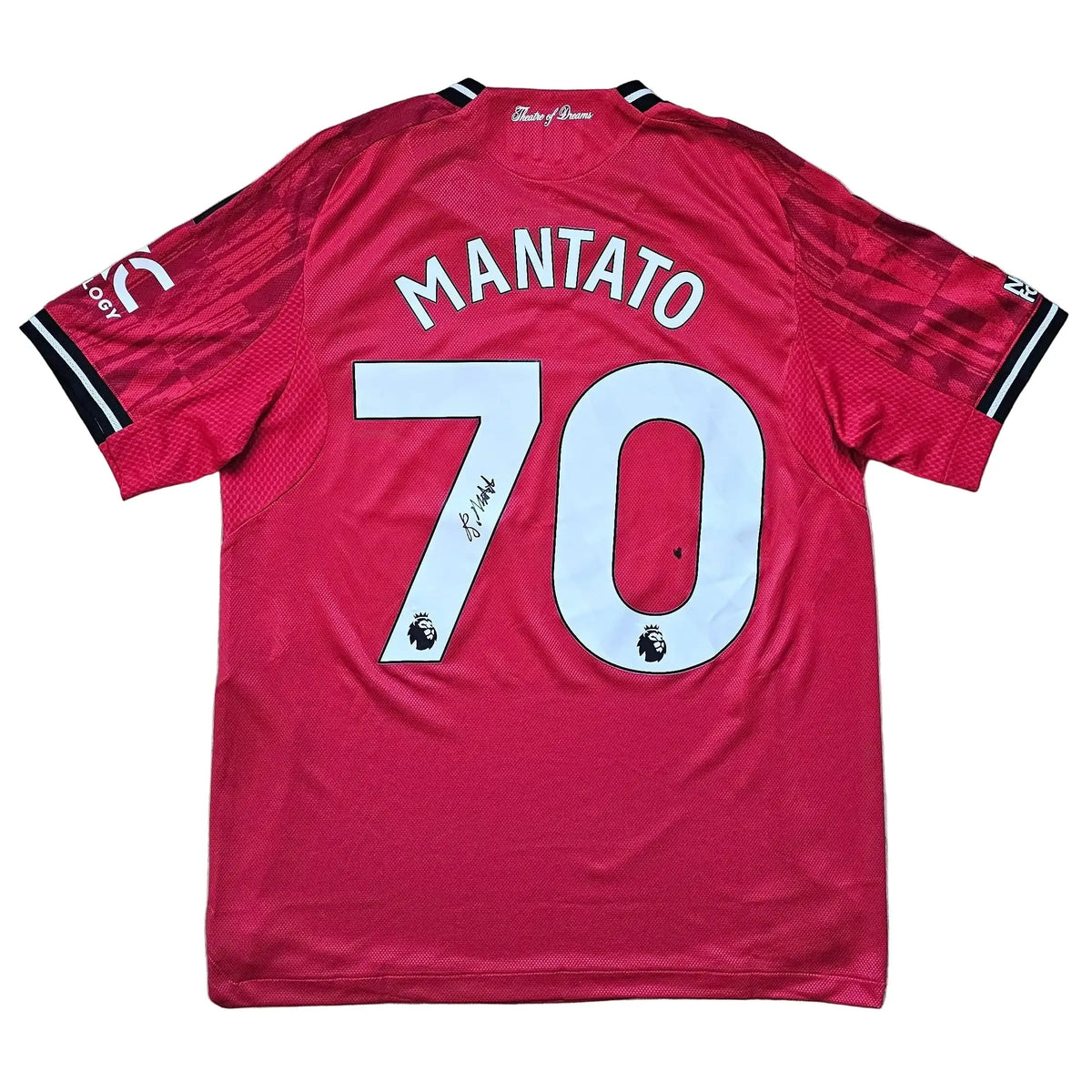 Back view of Bendito Mantato's red Manchester United F.C. shirt laid flat, MANTATO arched above No. 70 with a hand signature on the zero, 2025-2026.