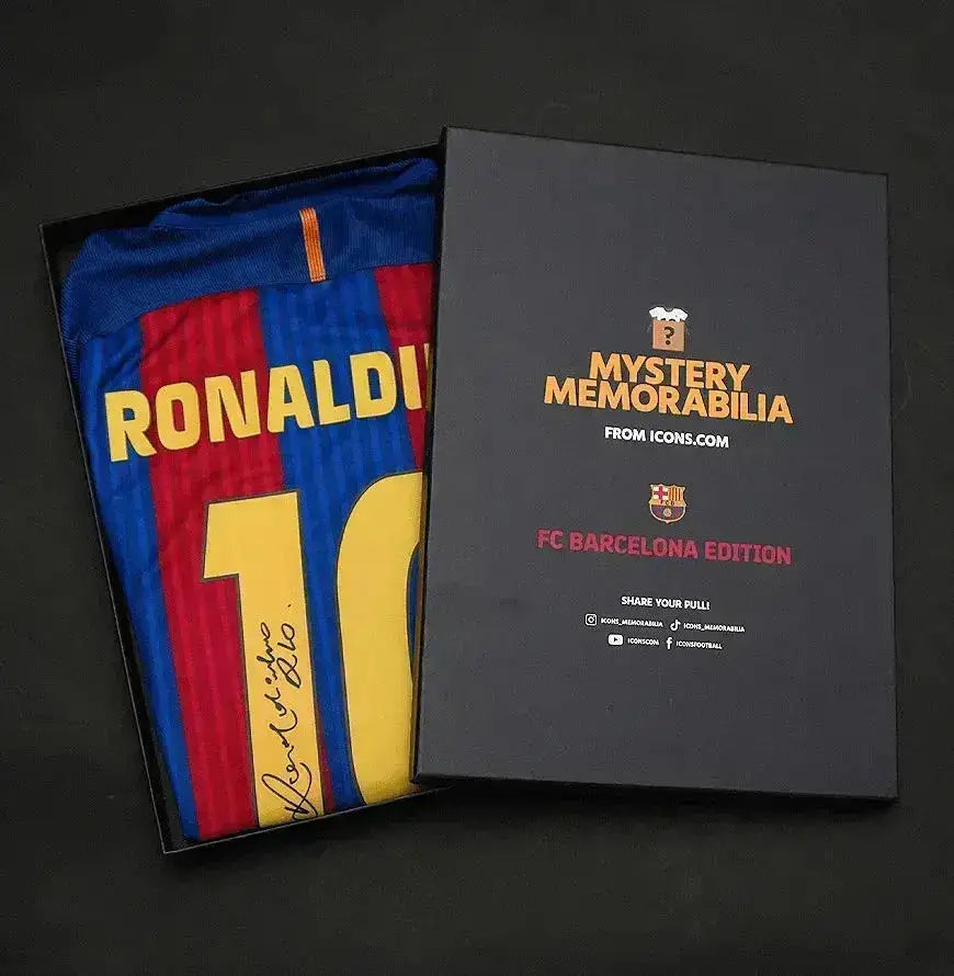 Front view of signed FC Barcelona soccer jersey featuring Ronaldinho and No. 10.