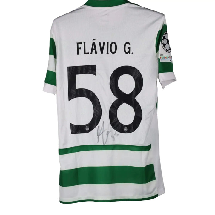 Back of a white and green hooped Sporting CP shirt with a black FLÁVIO G. nameset, number 58 and a grey-marker signature, Flavio Gonçalves' Sporting CP shirt.