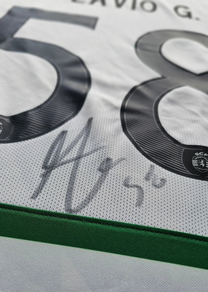 Close-up of the number 58 and a grey-marker signature on white fabric, from Flavio Gonçalves' signed Sporting CP shirt.