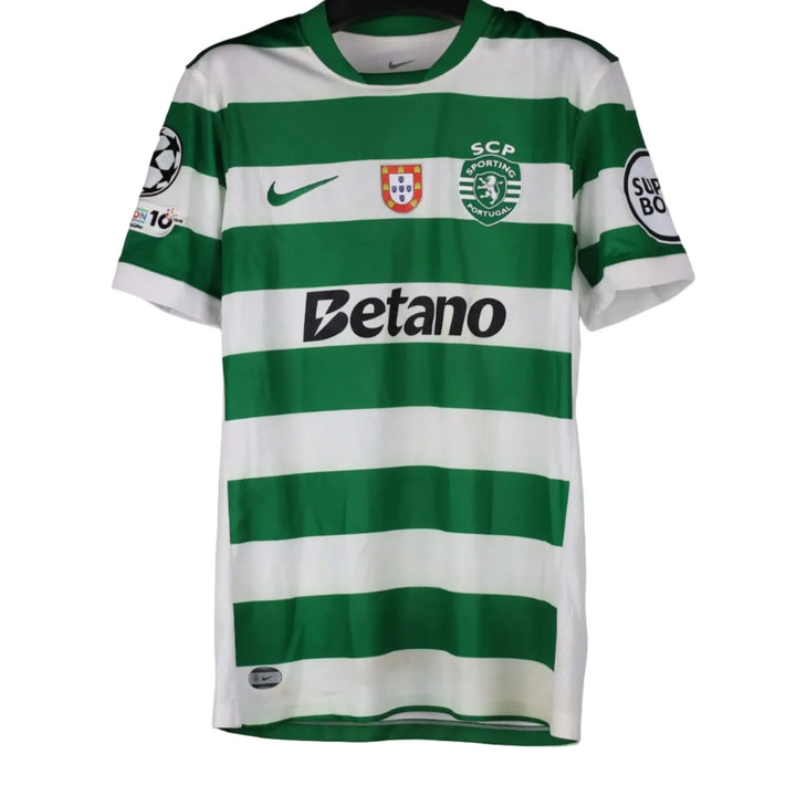 Front of a green and white hooped Sporting CP shirt with the Portugal and Sporting crests and Betano sponsor print, Geovany Quenda Sporting CP shirt.