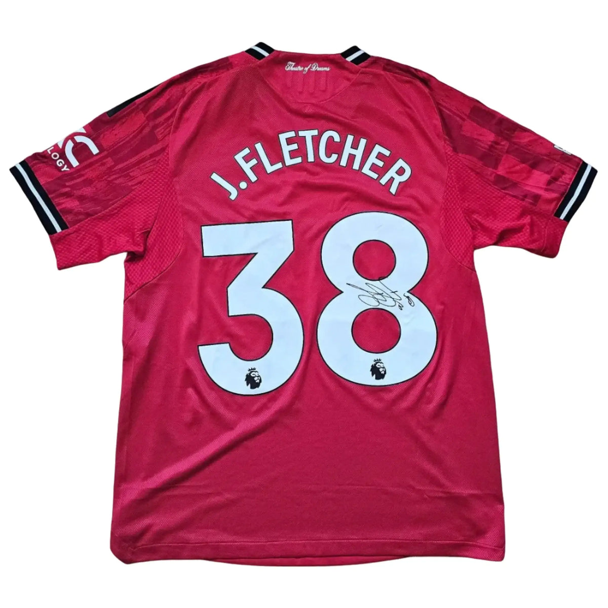 Back of Jack Fletcher's signed red Manchester United F.C. 2025-2026 shirt, 'J.FLETCHER' and number 38 in white, a black signature across the 8.