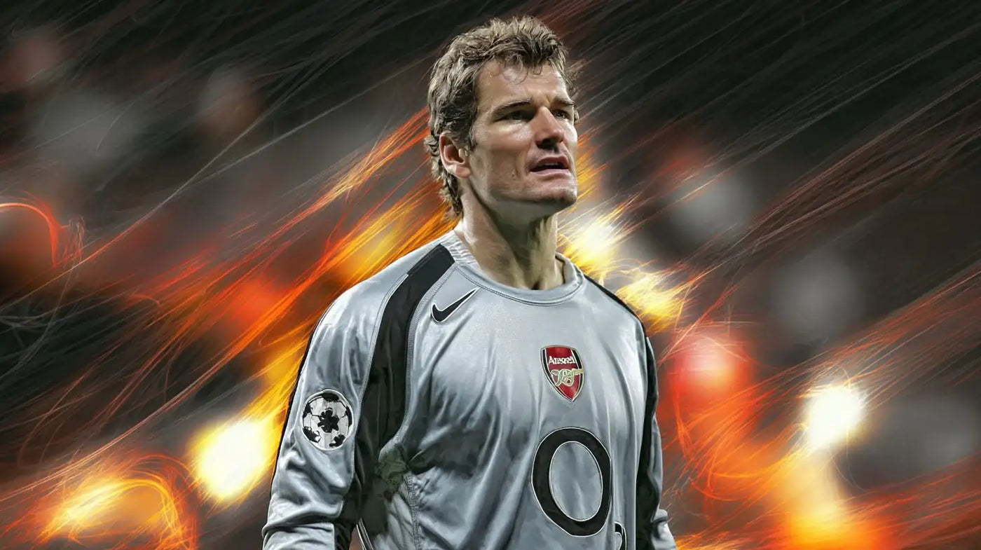 Jens Lehmann in a silver Arsenal goalkeeper shirt with Champions League patch looks focused in front of glowing orange stadium lights.