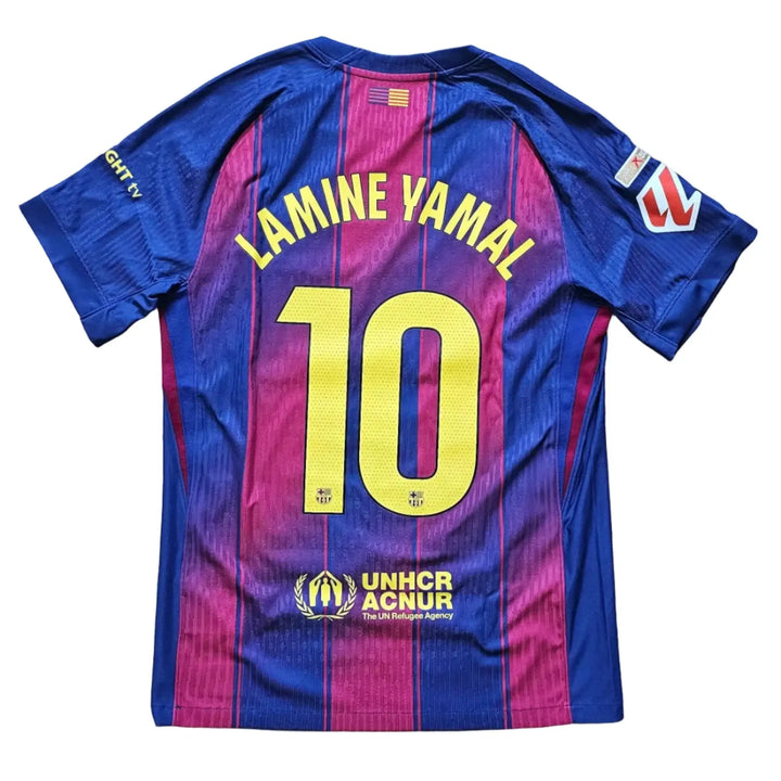 Back view of the Lamine Yamal Barcelona shirt with No. 10 and UNHCR ACNUR sponsor text below it.