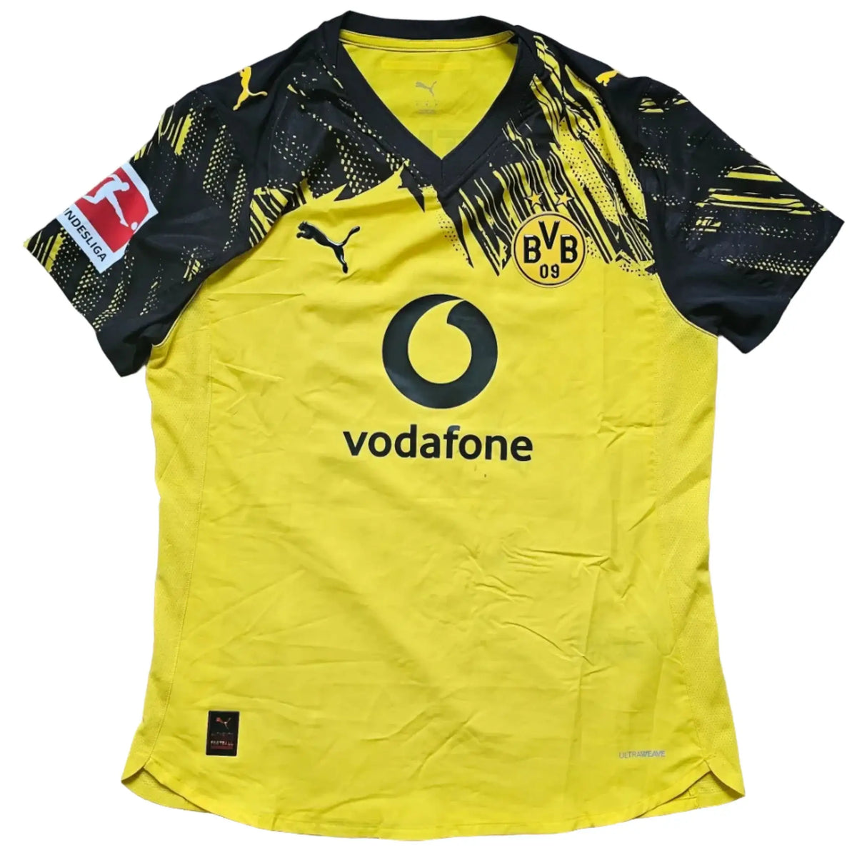 Borussia Dortmund 2025-26 home shirt front in yellow and black, with Puma branding, the Vodafone sponsor and BVB 09 crest.