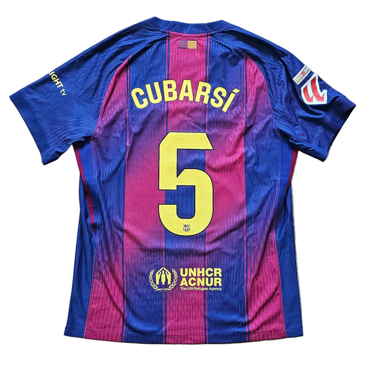 A blue and magenta striped FC Barcelona soccer jersey with 'CUBARSÍ 5' printed on the back.