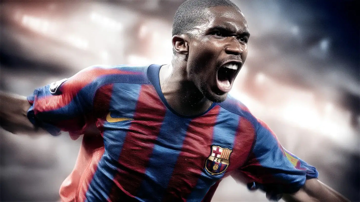 Samuel Eto’o shouting in a Barcelona blue and red striped football shirt with the club badge, arms outstretched in a stadium.