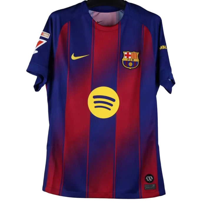 Front view of signed Lamine Yamal 10 Barcelona football shirt featuring yellow Spotify logo and club crest.