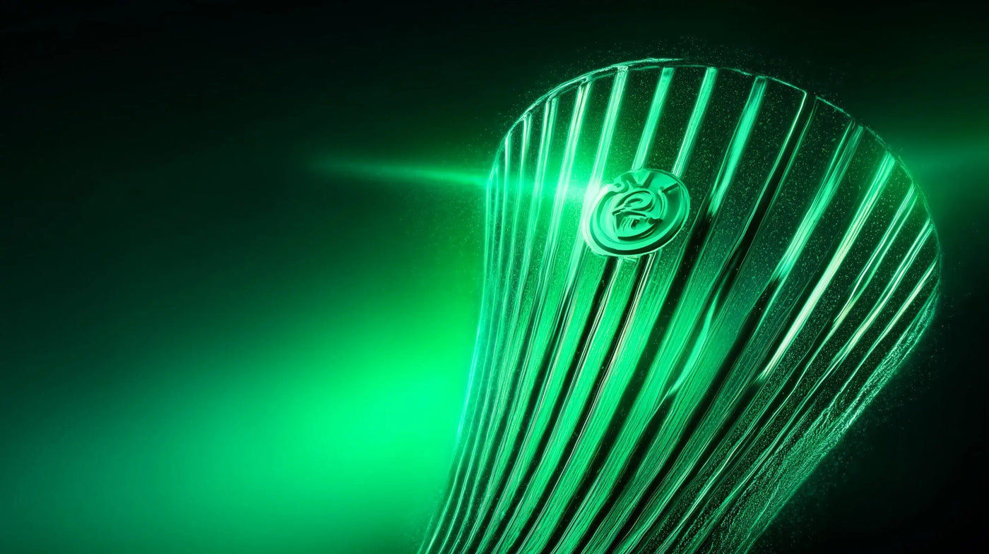 Glowing green stylized cup representing the UEFA Europa Conference League trophy on dark background.