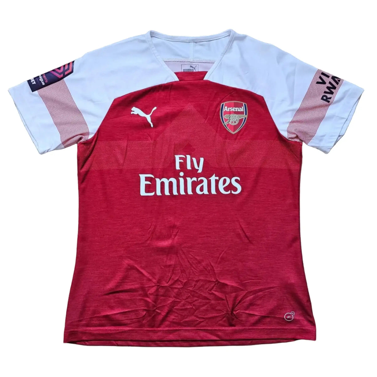 Close-up of the white 'MIEDEMA' nameset lettering on the shirt back, from Vivianne Miedema's 2018-2019 Arsenal shirt.